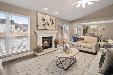 Family room has new laminate flooring, freshly pai