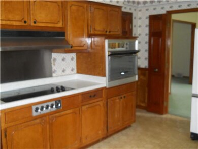 Smooth cooktop and built in stove.  Large walk in 