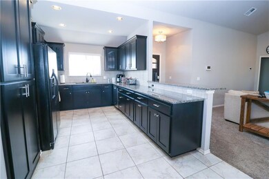 7003 Cherokee Crossing E, Warr Acres, OK 73132 - photo 3