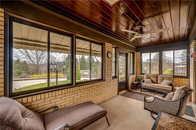 This enclosed sun porch is a great bonus space!