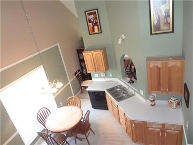 This is the view of the open area kitchen from the loft area bonus room.