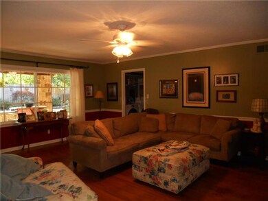 Windiws across rear of living room showcase outdoo