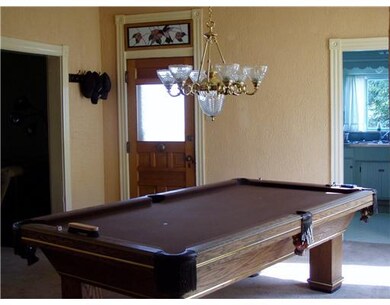 Dining Room. Back entry with stained glass transom
