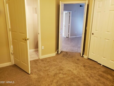 Den looking out to great room