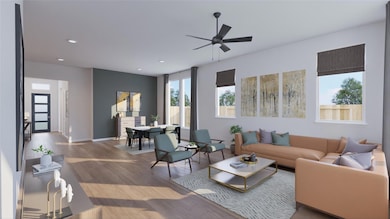 Living room featuring ceiling fan, wood finished 