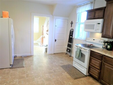 Entry foyer guides you into the oversized kitchen!