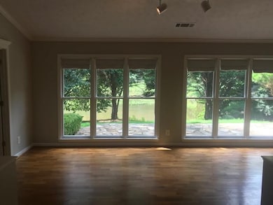 Entryway featuring wood finished floors, visible v