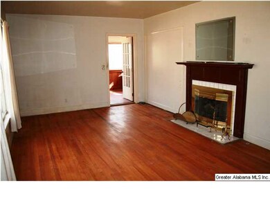 ANOTHER VIEW OF FAMILY ROOM WITH GASLOG FIREPLACE.