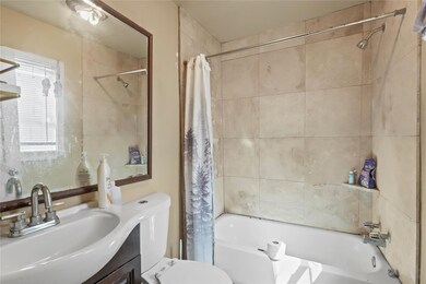 Full bathroom featuring shower / bathtub combinati