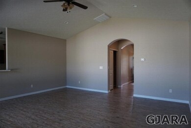 The spacious living room is the center of the home