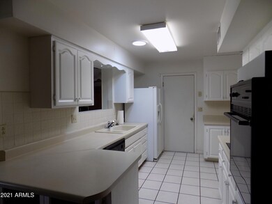 Kitchen with White Cabinets