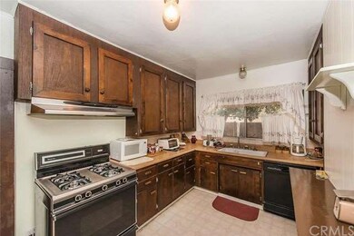 Another view of the kitchen - includes range, micr