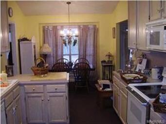 Nice and Light Kitchen looking toward Breakfast Ro
