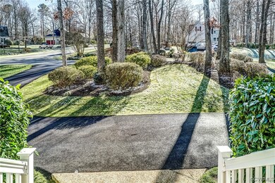 You'll love the convenience of the circular drive, and appreciate the lovely view  from the full front porch of your professionally landscaped front yard. An irrigation system serves the front and side yards.