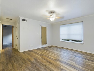 Unfurnished room featuring wood finished floors, 