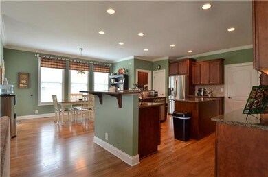 This spacious kitchen has beautiful cabinetry and 