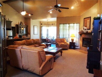 Open floor plan with cathedral ceiling.