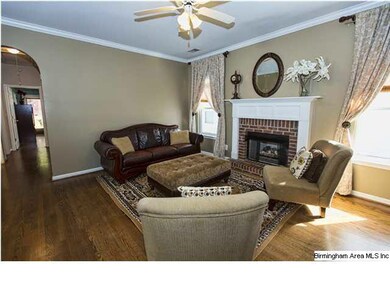 Large den with gas fireplace features lots of spac