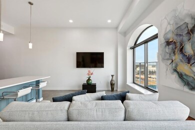 Living room featuring recessed lighting and baseb