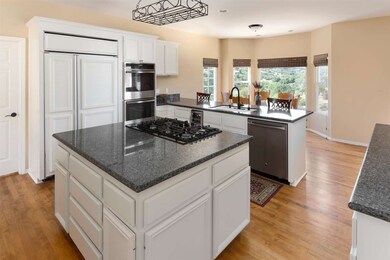 Fresh white cabinets and granite counters as well 