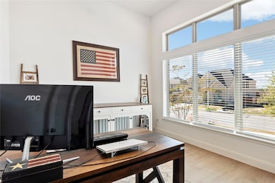 Office space featuring light wood finished floors