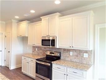 Another view of kitchen and pantry