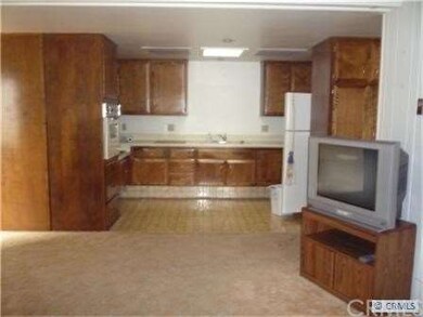 From living room looking into kitchen
