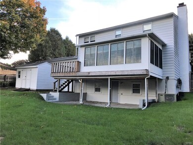 Back of Home. Sun room, Deck & Covered Patio