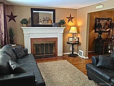 Living Room. Woodburning fireplace with gorgeous m