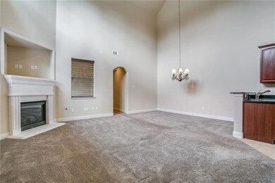 Vaulted ceilings and open living and dining room.