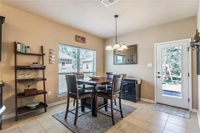 Dining area with a view of the outdoors.