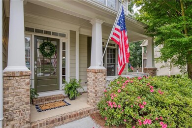 A welcoming covered front porch offers the perfect spot for morning coffee or evening chats.
