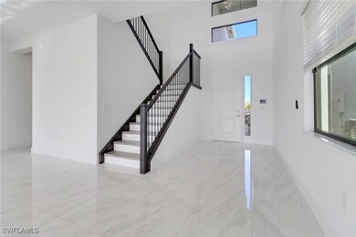 Foyer with a high ceiling