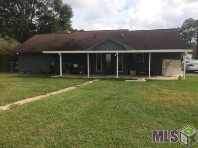 Large backyard with nice big covered patio.