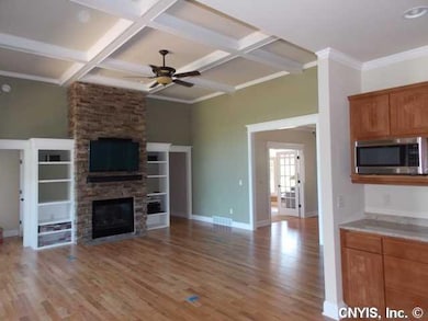 Great Room. Floor to ceiling stone work.