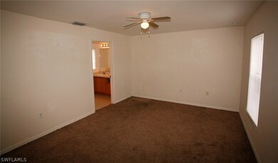 706 Oro Ave S, Lehigh Acres, FL 33974 - photo 5