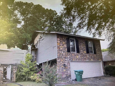 View of home's exterior with a garage