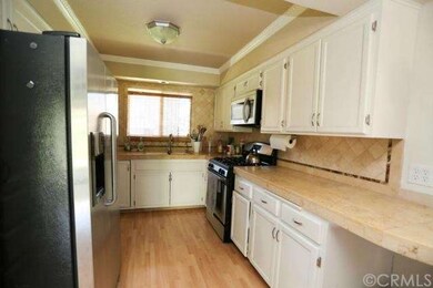 Plenty of counter top space and cabinet storage.