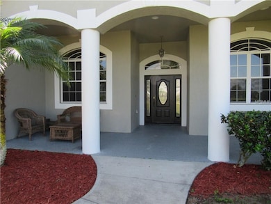 Welcoming Entrance and covered front porch extendi