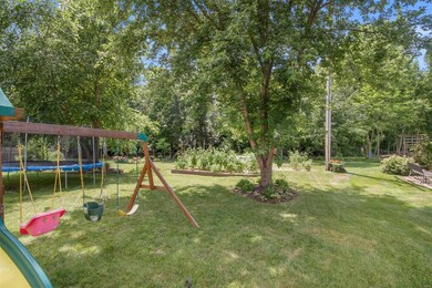 Large, level backyard backing to trees with great privacy.