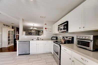 Kitchen features beautiful tile flooring