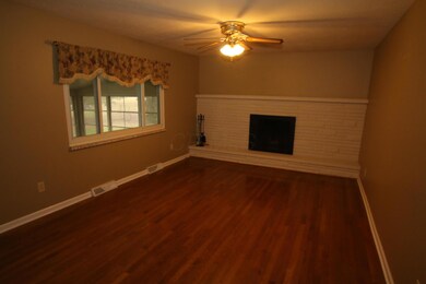 Family room with wood burning fireplace