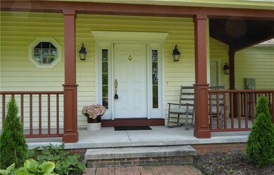 You Will Love this Covered Front Porch .... Sit an