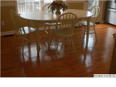 The hardwood floors shine with pride throughout this beautiful home!