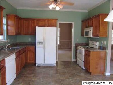 Spacious kitchen with new flooring