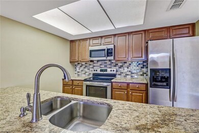 154 Cypress Way E unit 1108, Naples, FL 34110 - photo 2