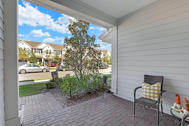Covered porch with a residential view