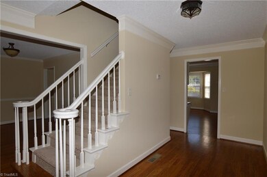 Access to half bath from foyer.