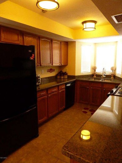 Kitchen w/ Granite Slab Countertops