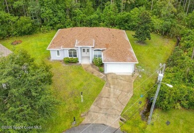 27 Utide Ct, Palm Coast, FL 32164 - photo 2